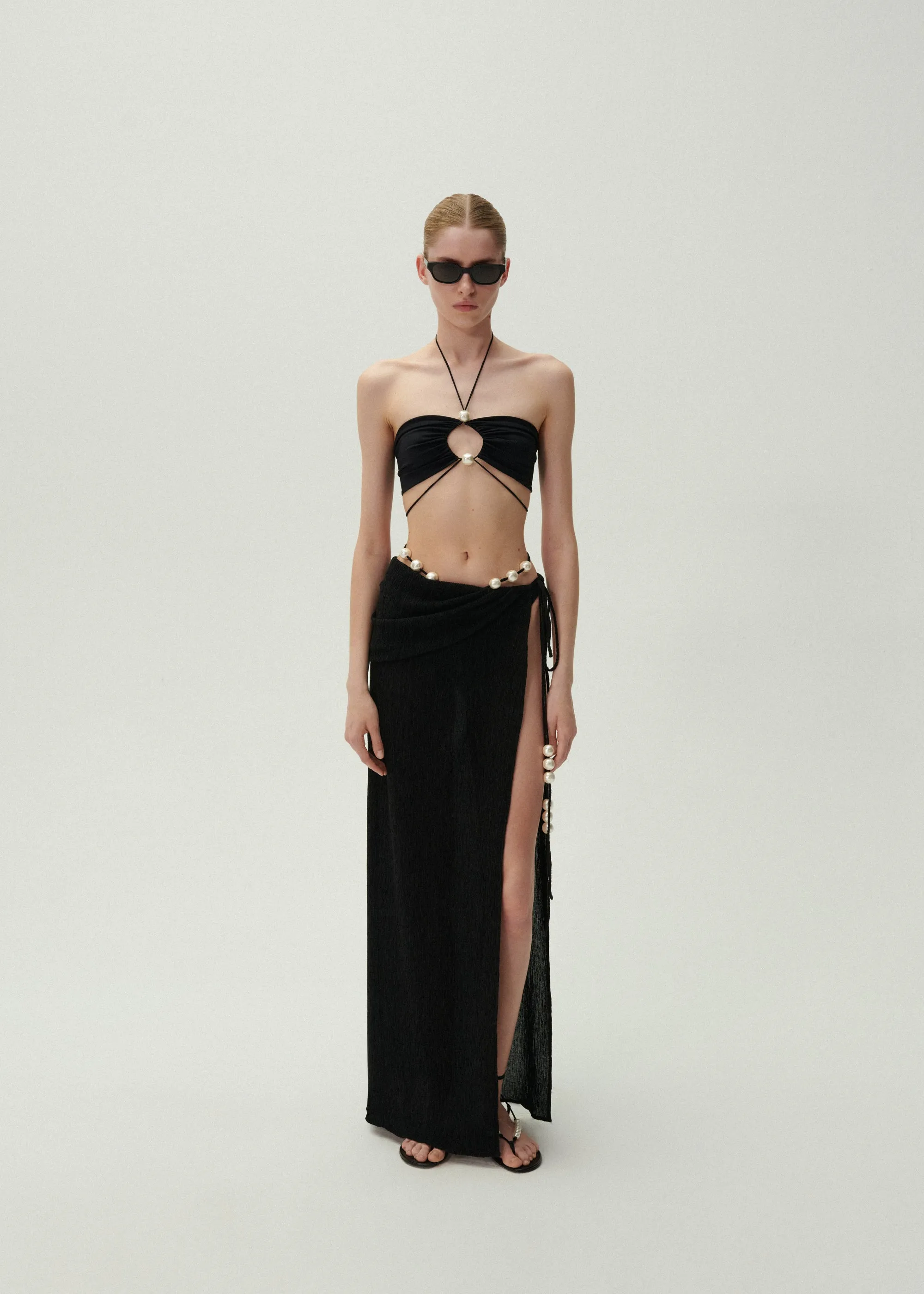 Asymmetrical pearl maxi skirt in black